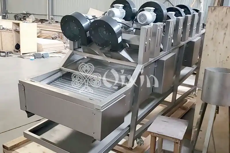 Continuous vegetable dewatering machine